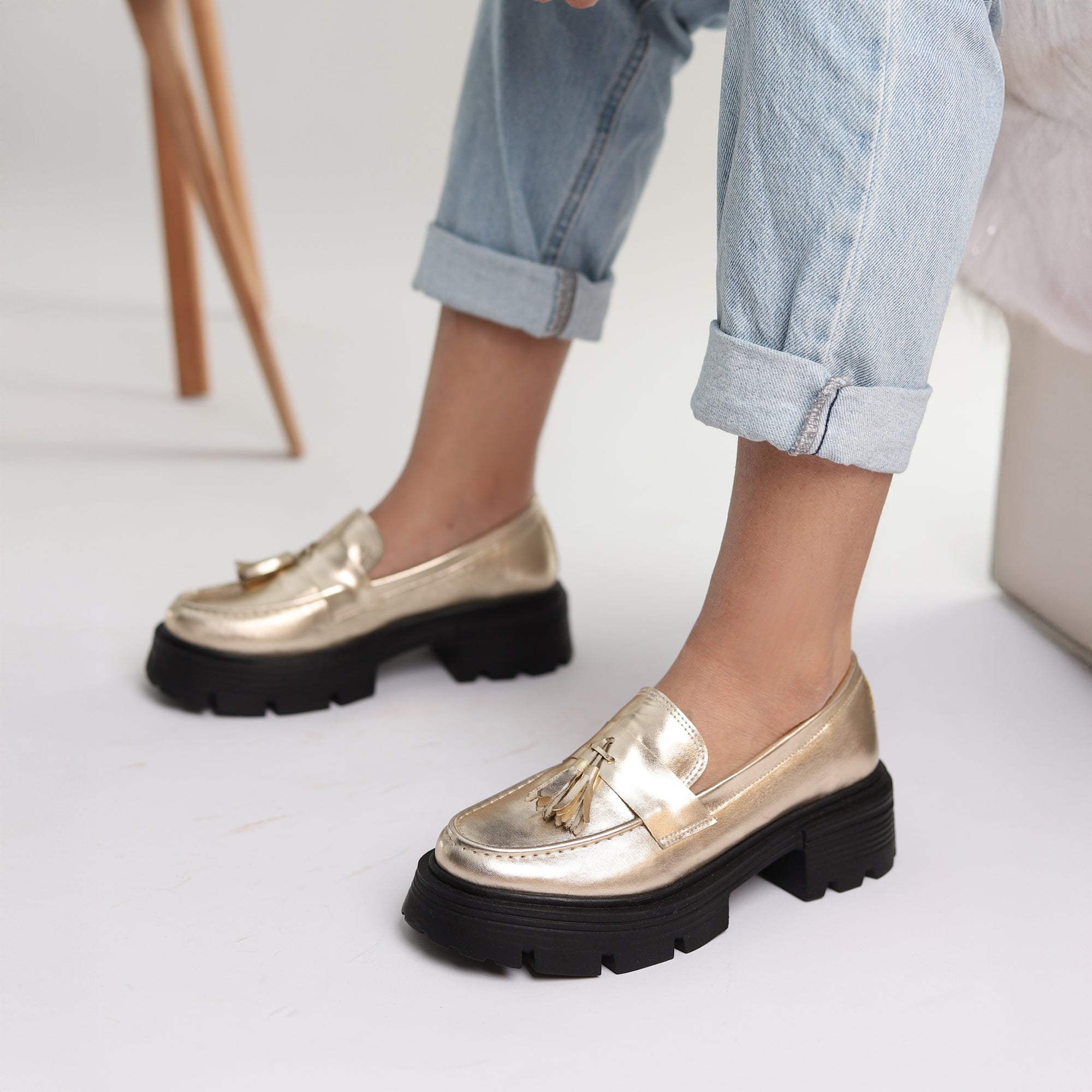 Golden Crest Tassel Loafers