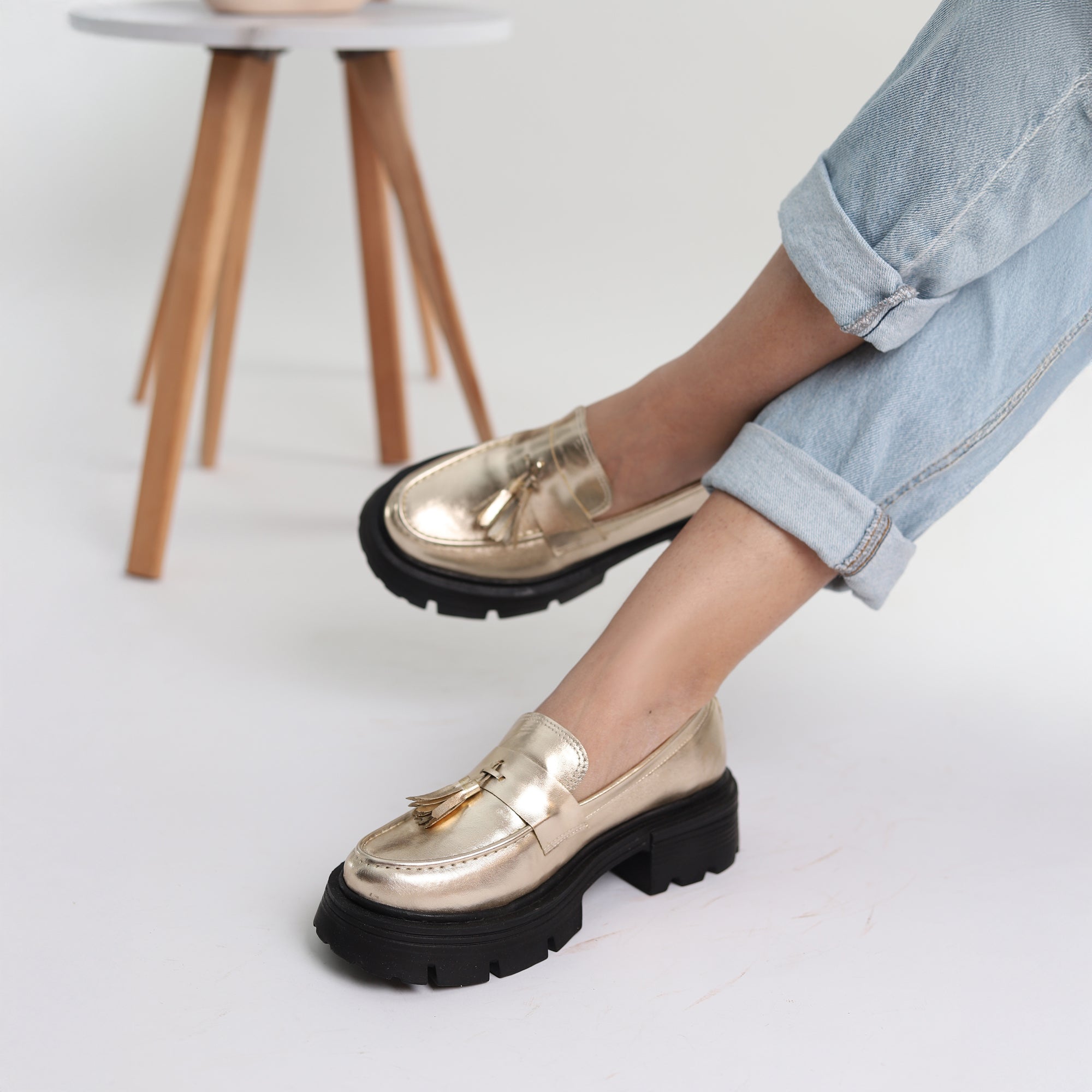 Golden Crest Tassel Loafers